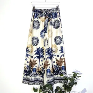 Caribbean style palm print straight leg trousers with tie waist and pockets