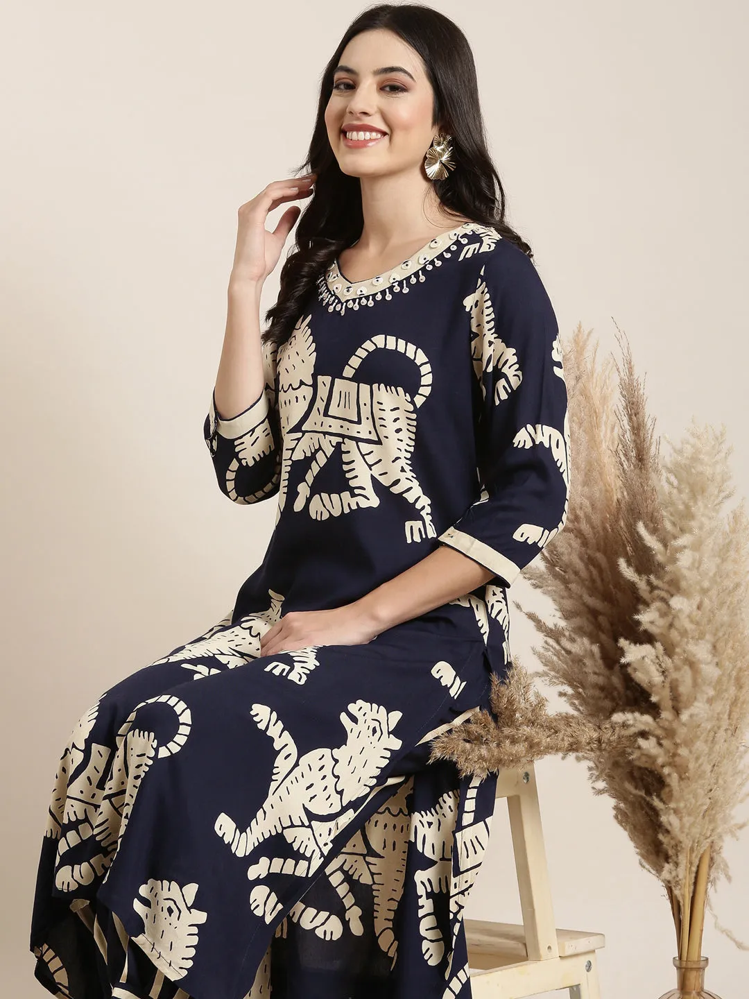Women Straight Navy Blue Ethnic Motifs Kurta and Trousers Set