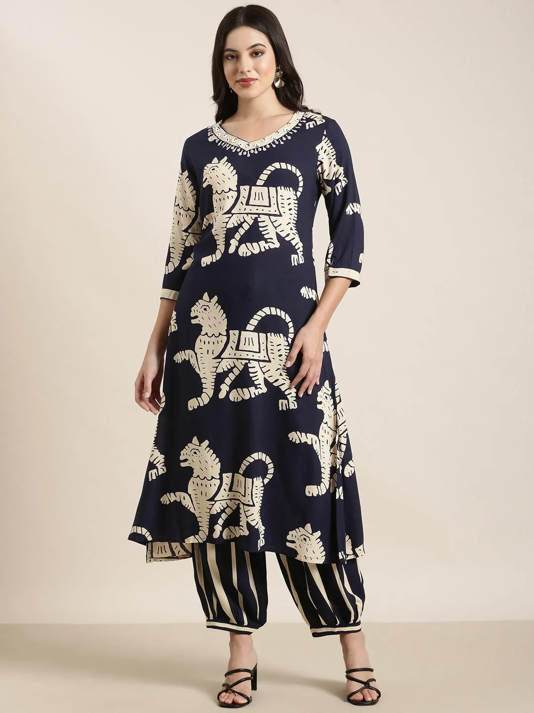 Women Straight Navy Blue Ethnic Motifs Kurta and Trousers Set